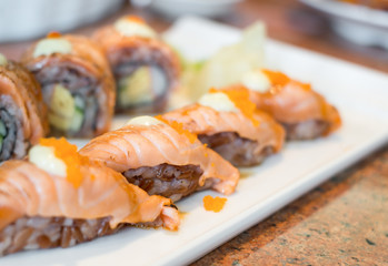 Sushi roll on a plate,selection focus point