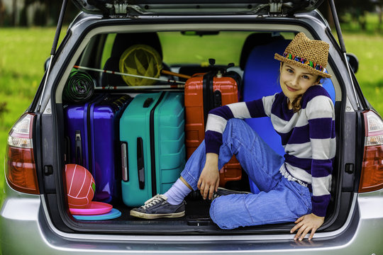 Summer vacation, young girl ready to travel for summer holiday