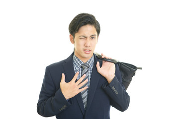 痛みを訴える男性