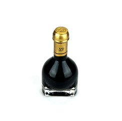 Traditional italian balsamic vinegar inside a special bottle iso