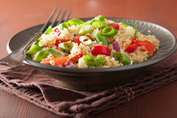 healthy couscous salad with tomato cucumber onion chives