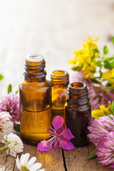 Fototapeta na wymiar essential oils and medical flowers herbs