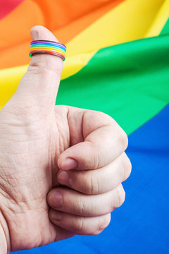 Ring rainbow gay on his finger