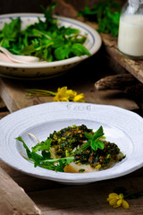 The baked fish fillet with a ramson