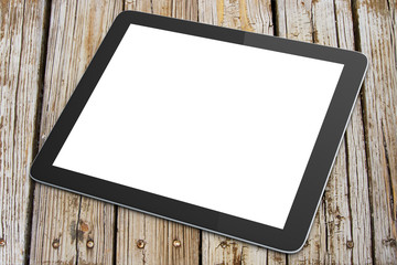 Blank digital tablet on a wooden table