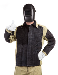 Welder in workwear suit.