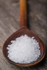 Sea salt on a wooden spoon