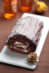 Yule log cake on a Christmas table