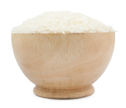 rice on wood cup isolated