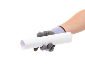 Hand in gray glove holding paper roll.