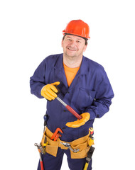 Worker in hard hat holding hammer.