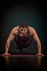 Fototapeta premium athletic young man exercising