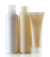 Group of cosmetic bottles isolated on white