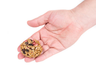 Candied roasted peanuts sunflower seeds in hand.