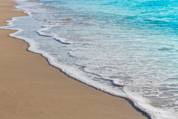 Wave of sea on the sand beach