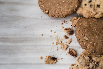 Chocolate cookies on wooden table with copyspace