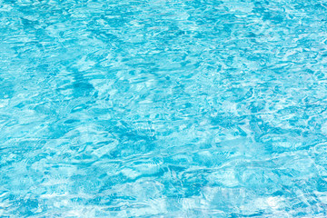Blue swimming pool rippled water