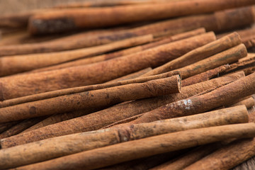 Cinnamon sticks on wood table
