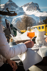 spritz aperitif, orange cocktail on wooden table outdoor in moun