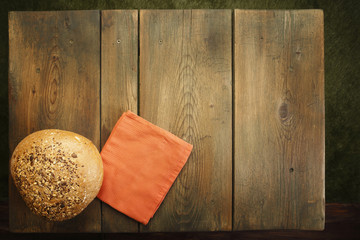 Bread and napkin on picnic table