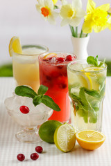 Three glasses of refreshing drink Mohito