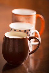 Three cups with milk