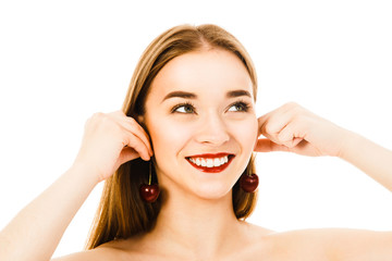 Obraz premium beautiful woman with cherry as earrings