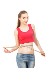 beautiful slender girl measures the waist  isolated in white bac