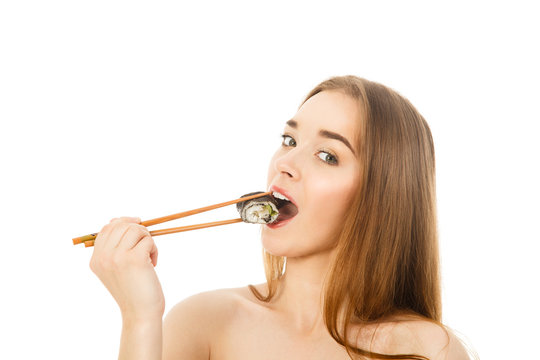 beautiful woman with sushi and chopsticks isolated