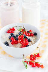porridge with berries and milk