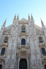 Fototapeta na wymiar Front of Milan Cathedral with blue sky