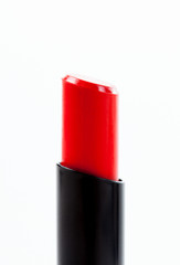 Obraz premium Red lipstick on white background