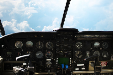 dashboard in airplane cockpit and view of sky