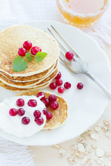 Pile of pancakes with berries