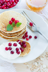 Pile of pancakes with berries