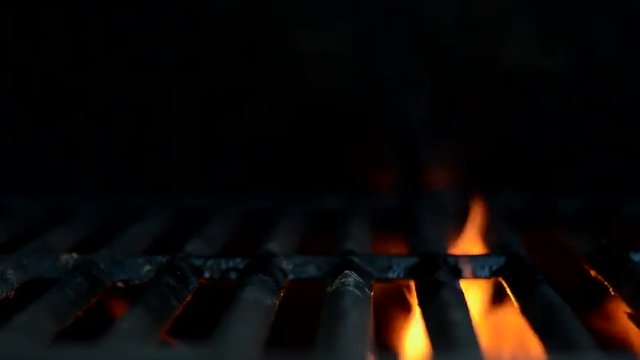 Flames flare on a grill