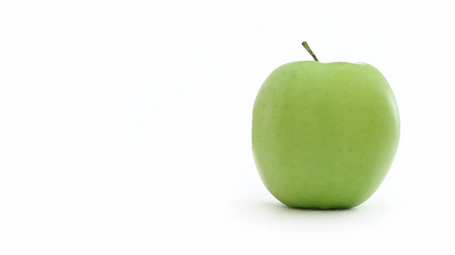 Green apple bitten
