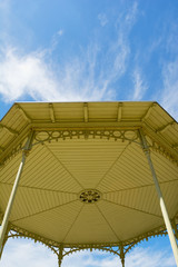 Gazebo in the Park on Blue Sky Background