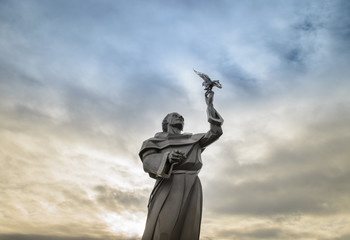 Saint Francis statue holding a dove