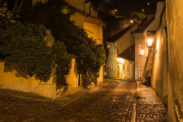Old street of Hradcany in Prague at night. Czech Republic
