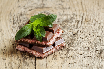 Milk chocolate with a pink stuffing, selective focus