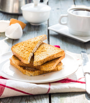 crispy toast with a fried egg and a cup of coffee. breakfast