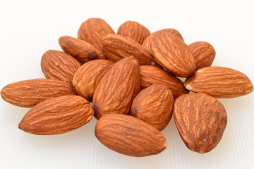 Almond nuts on a white background on the table