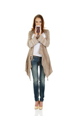 Beautiful woman with cup of coffee.