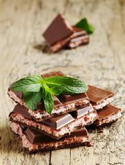 Milk chocolate with a pink stuffing, selective focus