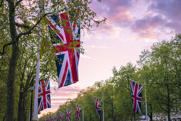 Lines of union jack flags hanging along the Mall, London - obrazy, fototapety, plakaty