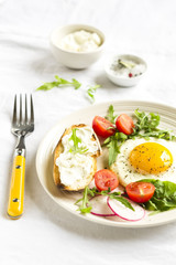 fried eggs and toast with cheese