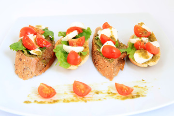 tapas with mozzarella and cherry tomatoes