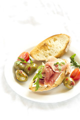 sandwich with ham and olives 