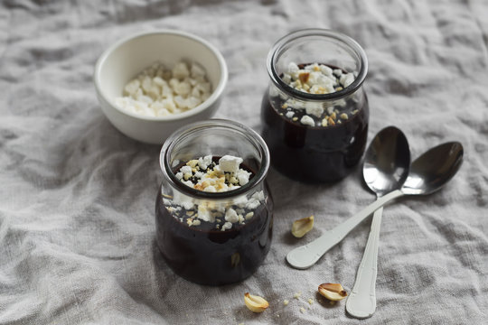 Chocolate Pudding With Meringue Crumbs And Nuts 